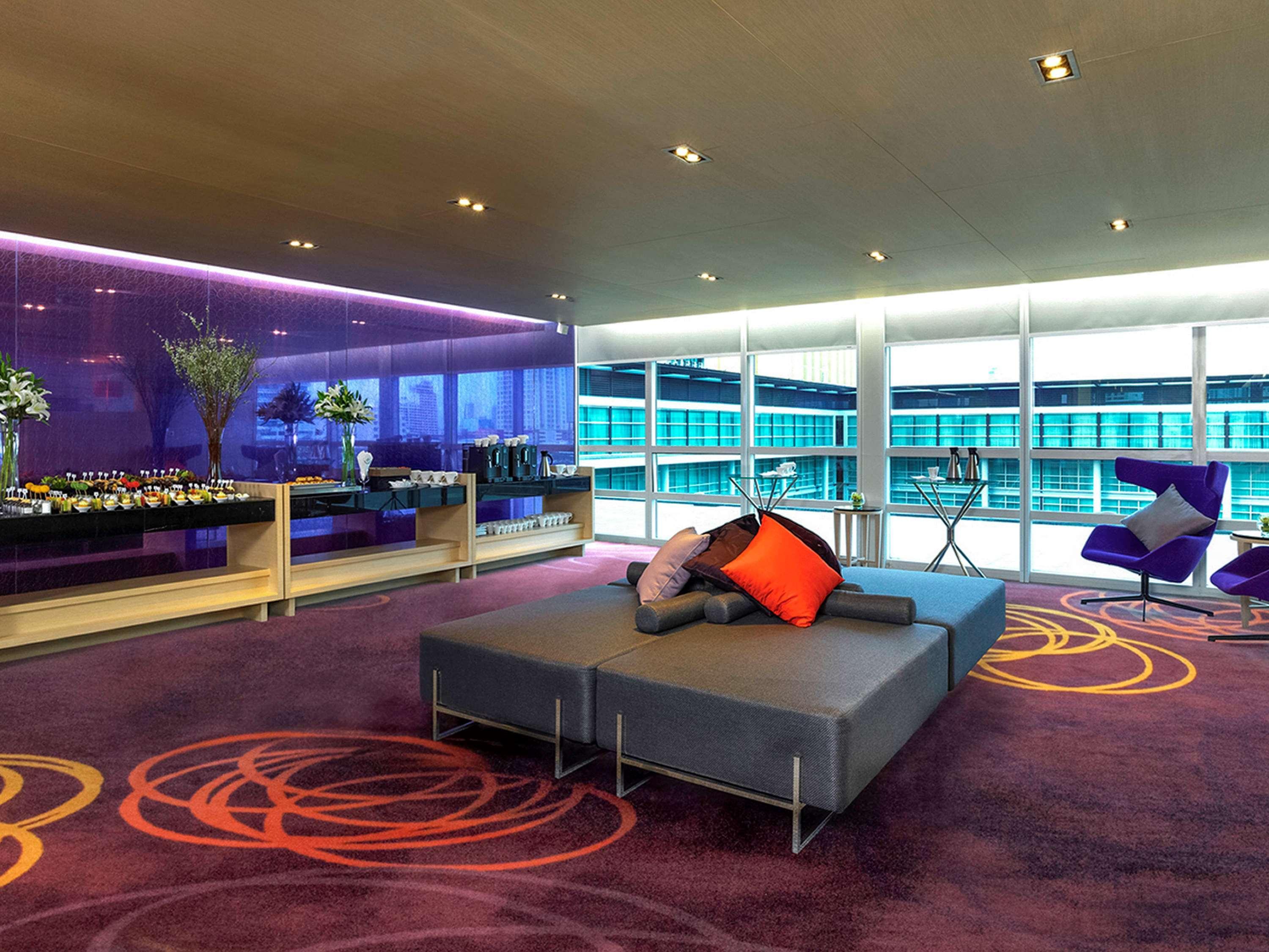 Pullman Bangkok King Power Hotel Exterior photo The interior of the W lounge at London Heathrow Airport